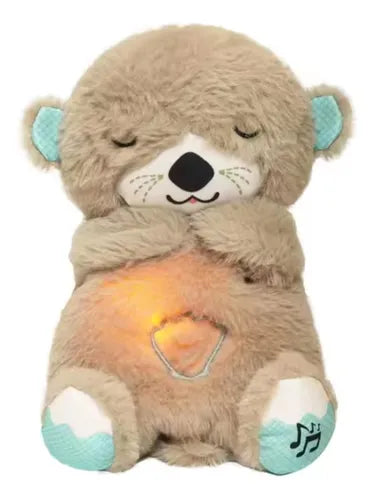 Peluche Nutria que respira, material suave, sonidos y luz relajante.